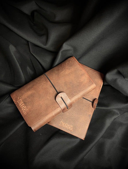 Mažos odinės užrašinės