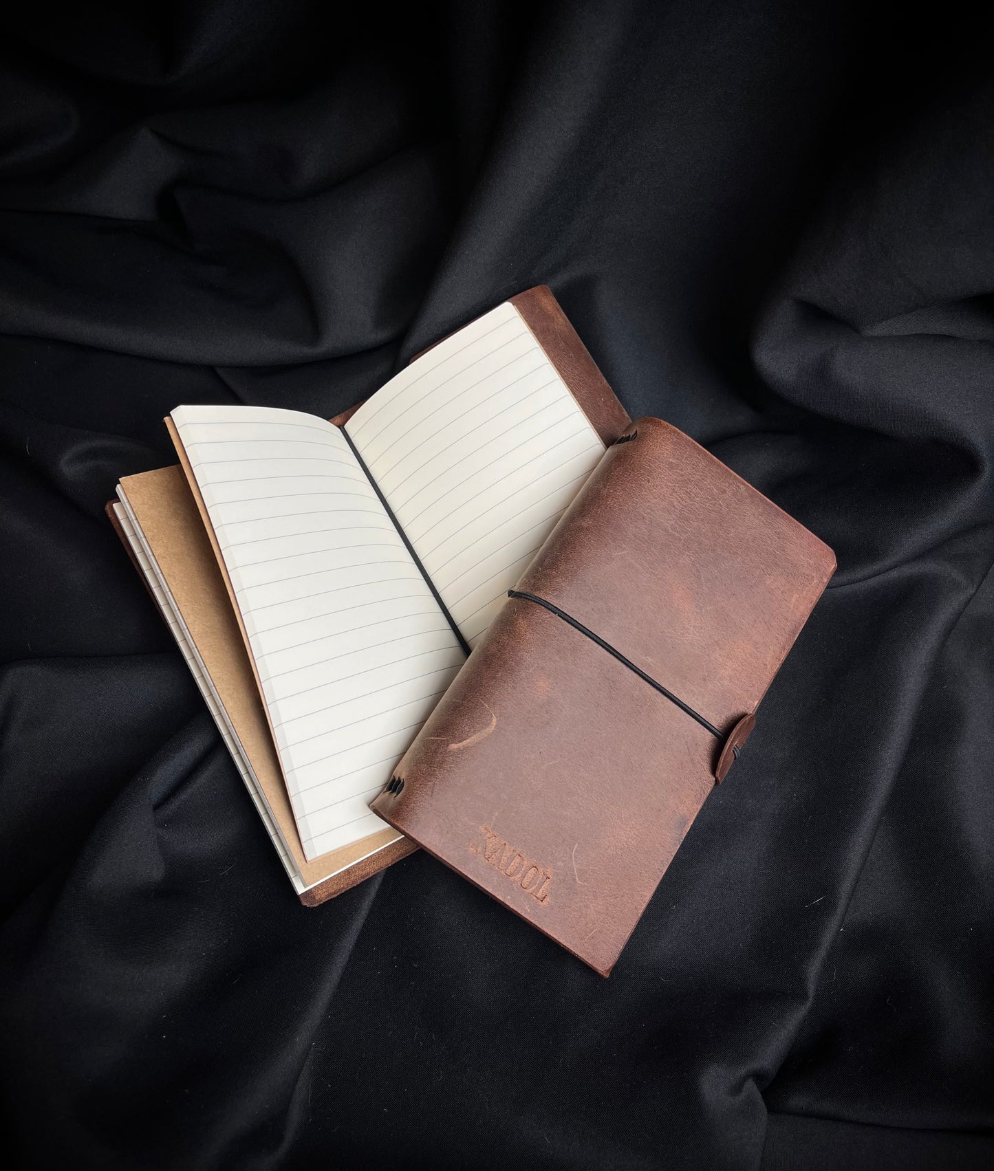 Mažos odinės užrašinės